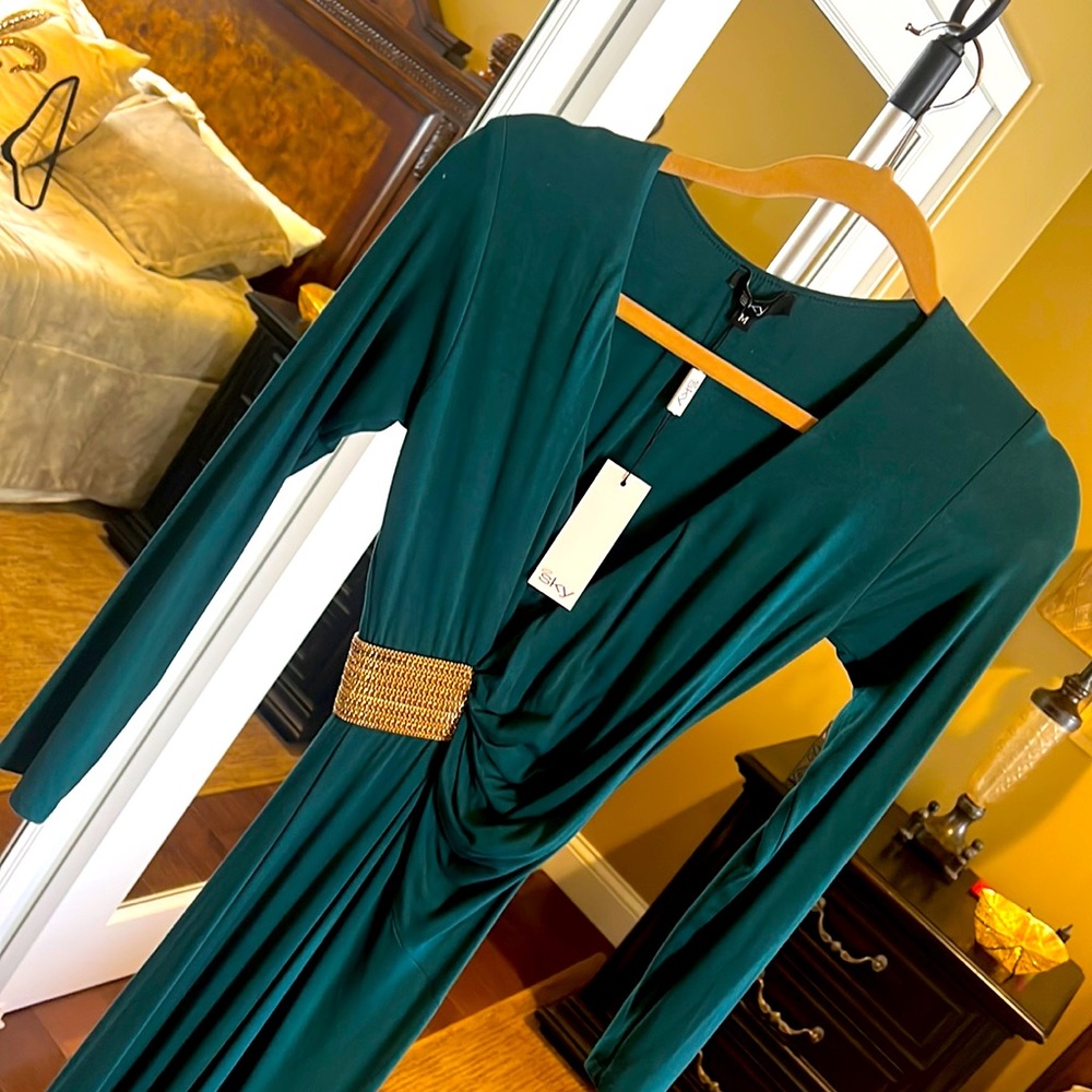 Sky dress brand new with tags size medium but runs small.